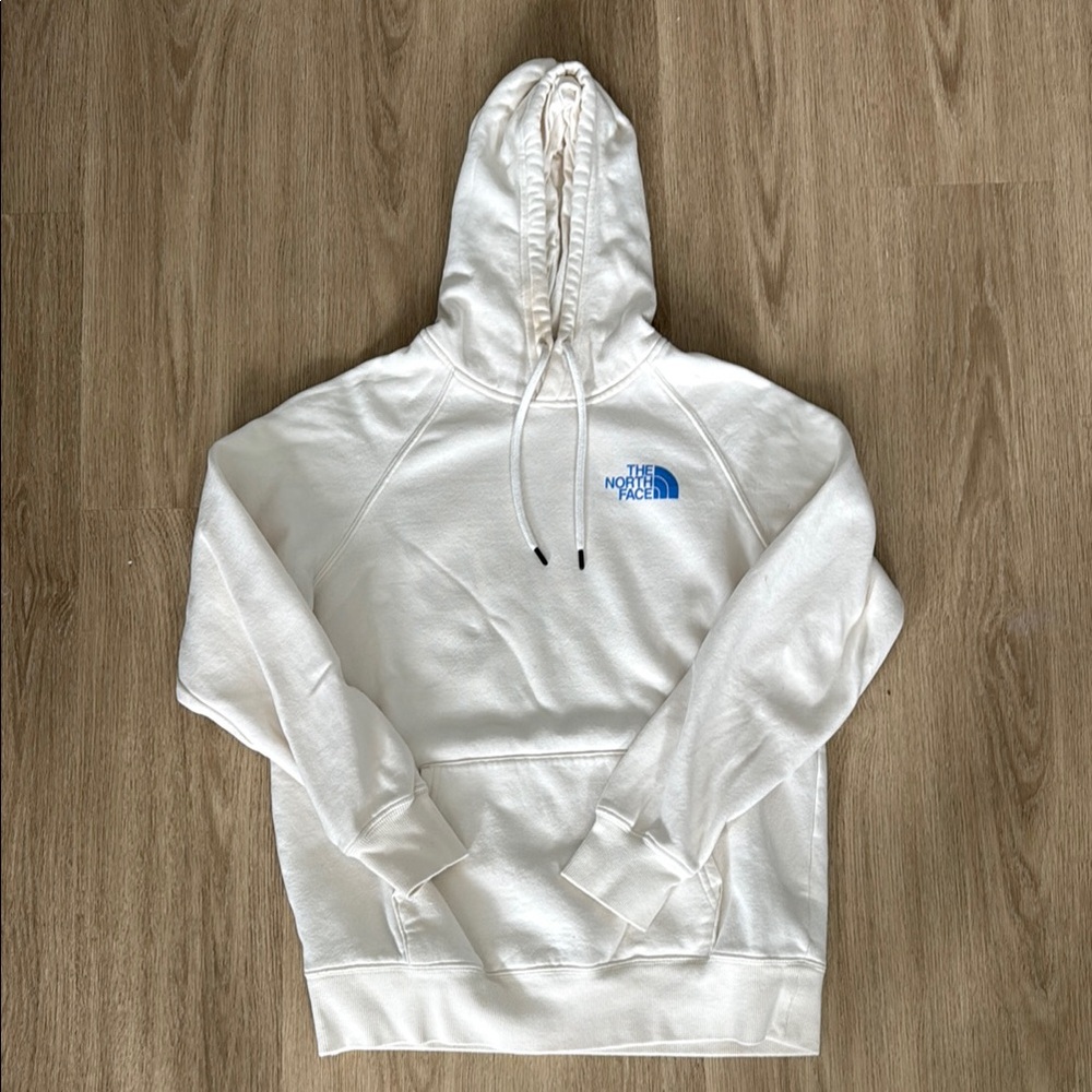 The North Face Off-White Hoodie with Blue Logo